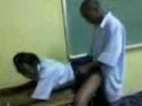 Photo: shs teacher caught red handed with a student in classroom.